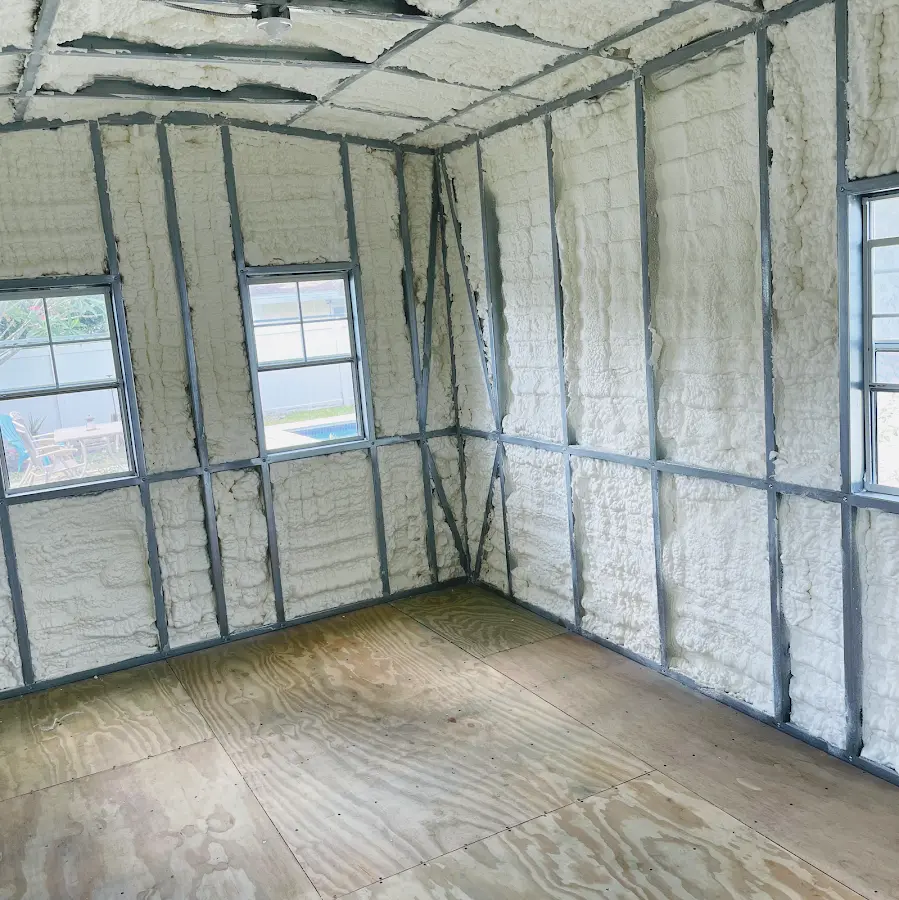 Closed-cell spray foam insulation applied to wall cavities in a residential project in Conway